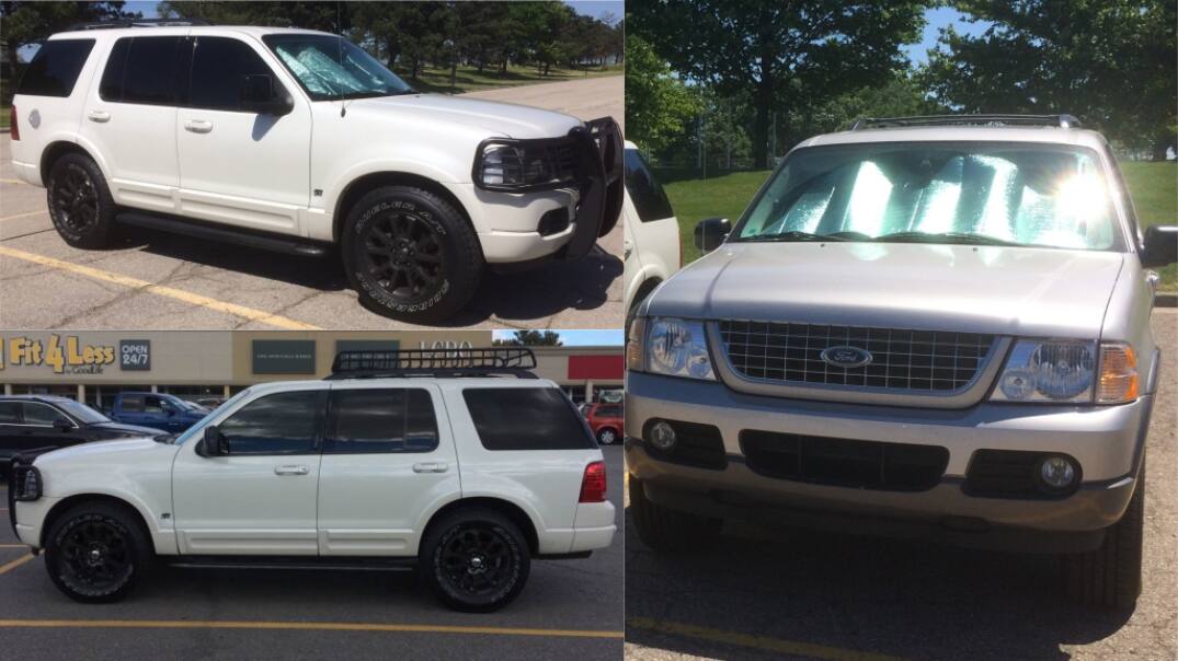 My Explorer, a white 2003 Limited. The silver 2003 XLT Sport belongs to a friend. Trevor Fisher My Explorer, a white 2003 Limited. The silver 2003 XLT Sport belongs to a friend. Trevor Fisher